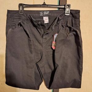 No Boundaries, mid rise black skinny jeans.